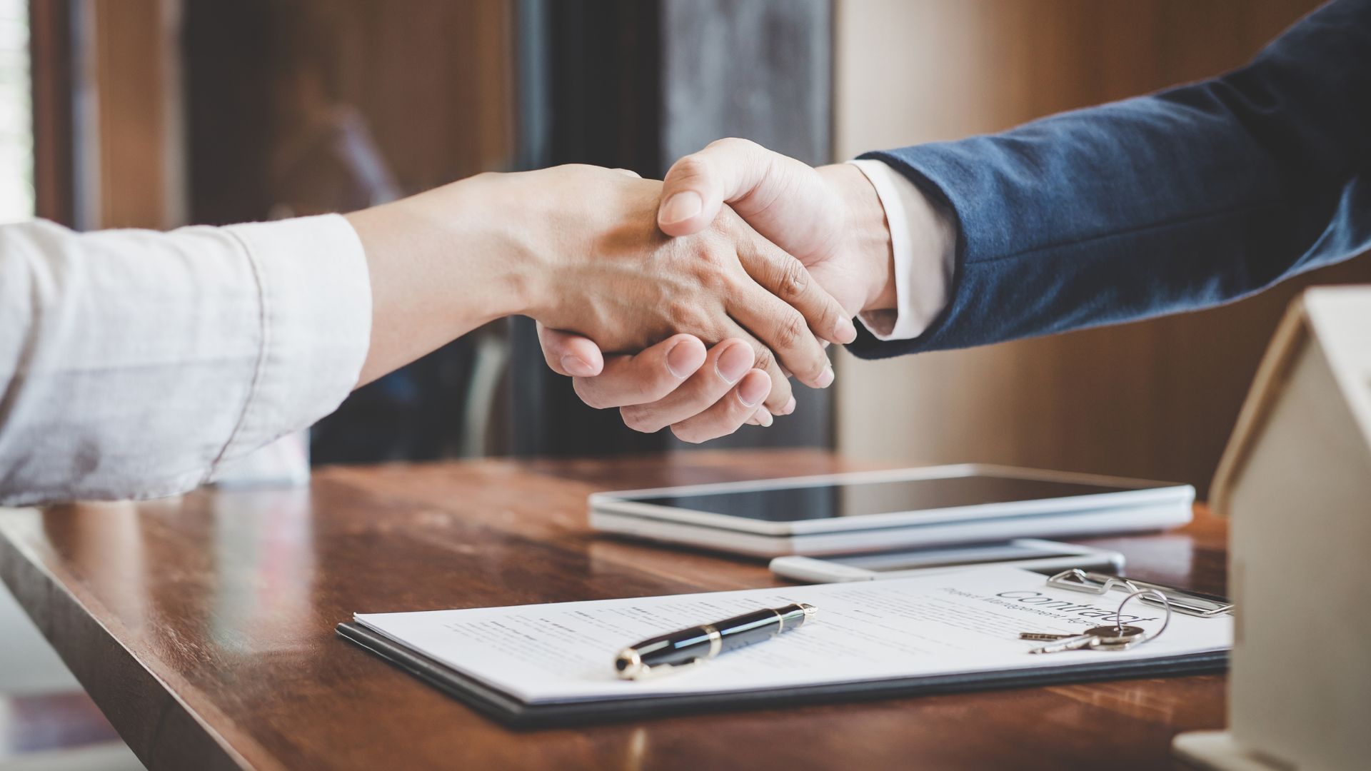two people shaking hands